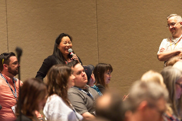Audience member asks question at previous HighEdWeb conference