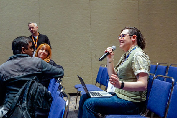 Audience member asks question at earlier HighEdWeb conference