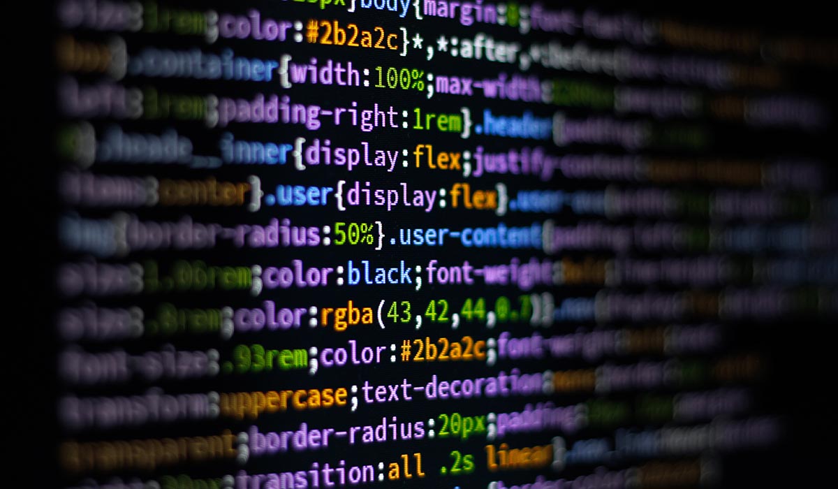 Stock photo of computer code on a screen. Color and padding elements are visible.