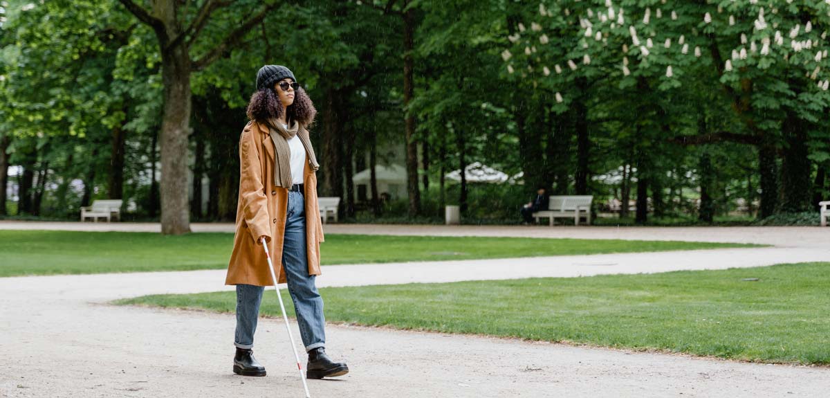 Blind women walking in the park